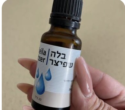 הבקבוקון מוחזק ביד, מבט מקרוב